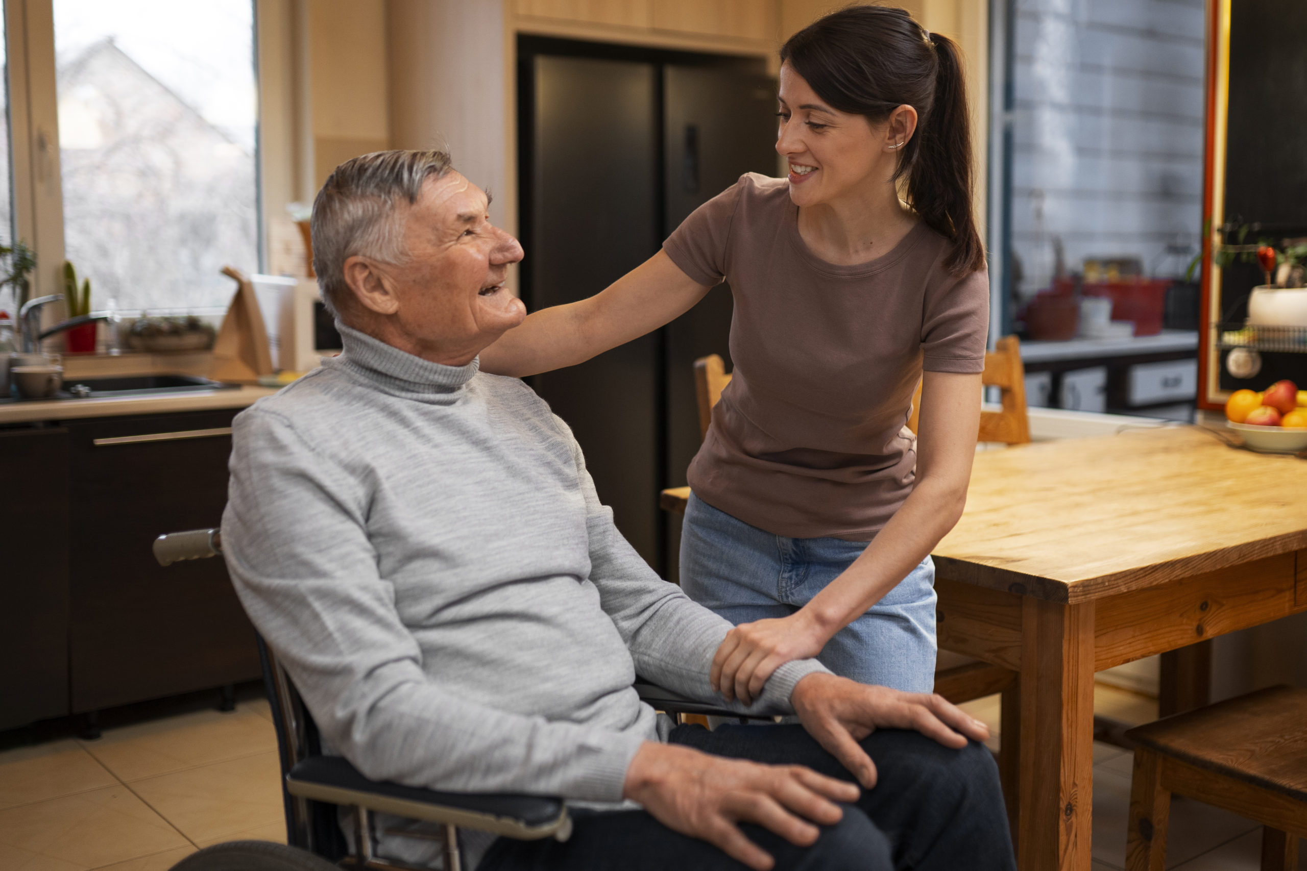 elderly-person-being-taken-care-by-female-caretaker