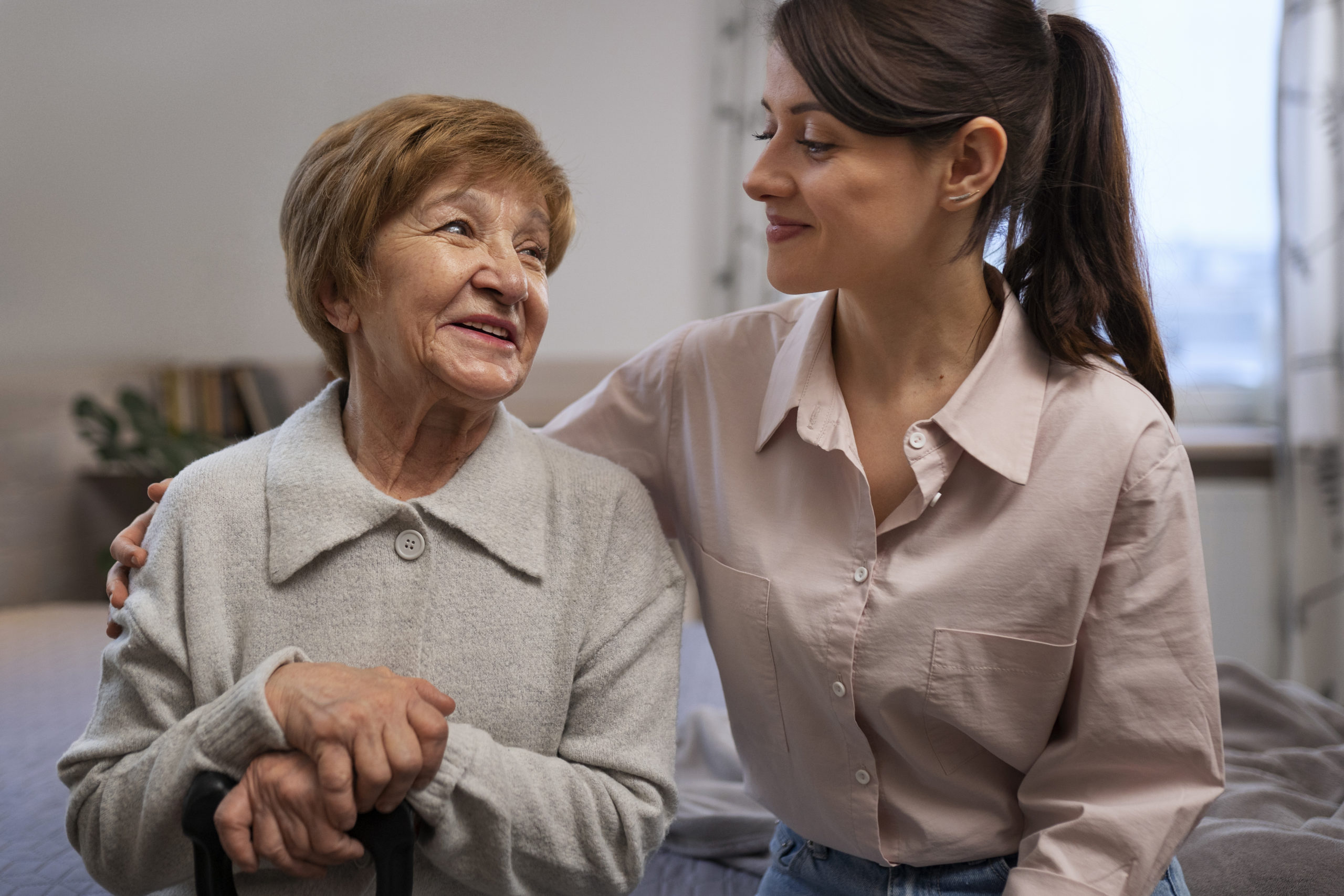 female-nurse-taking-care-elderly-person